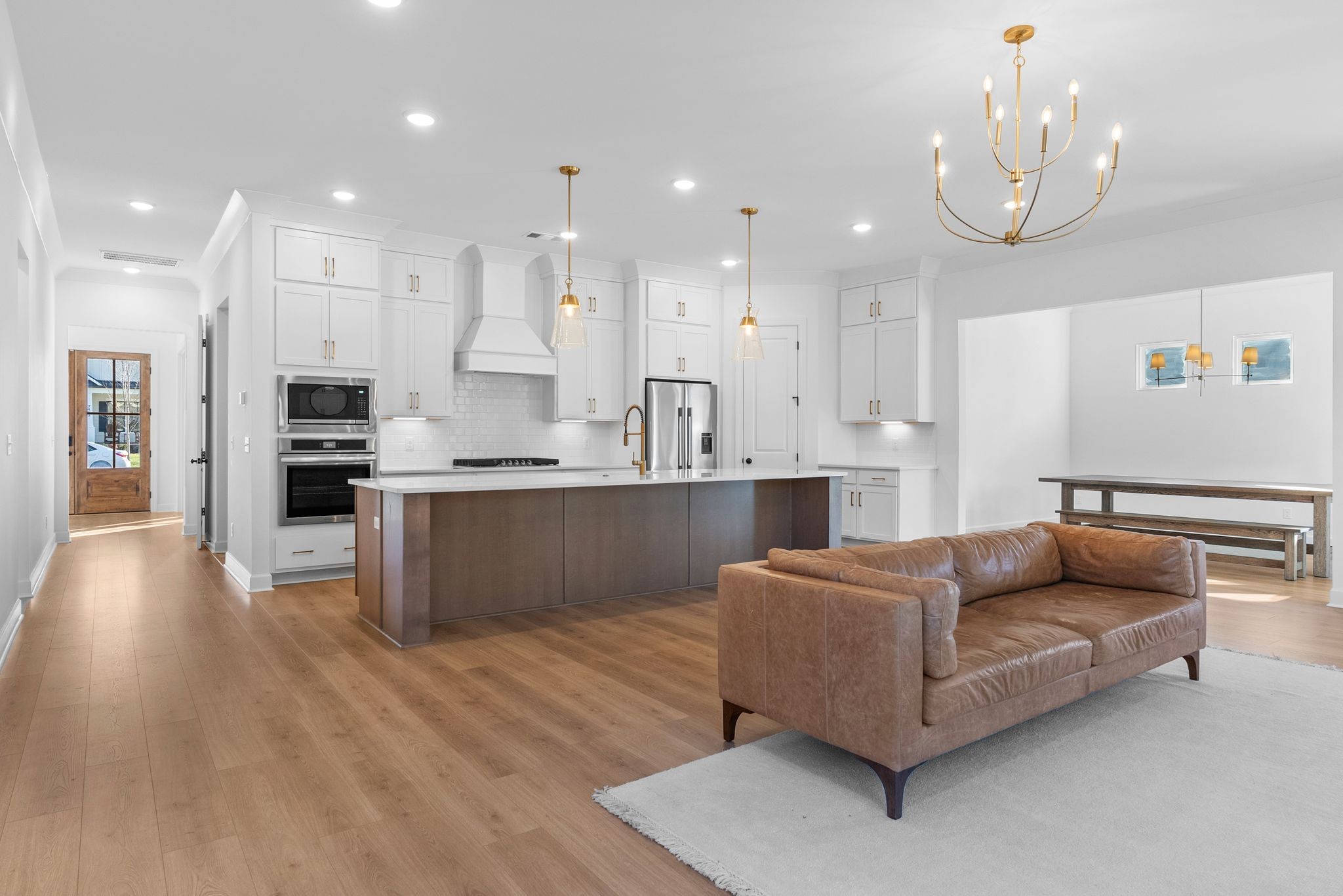 7440 Atwater Circle Fairview, TN 37062 - Photo 12 of 43 a living room with stainless steel appliances kitchen island granite countertop furniture and a view of kitchen