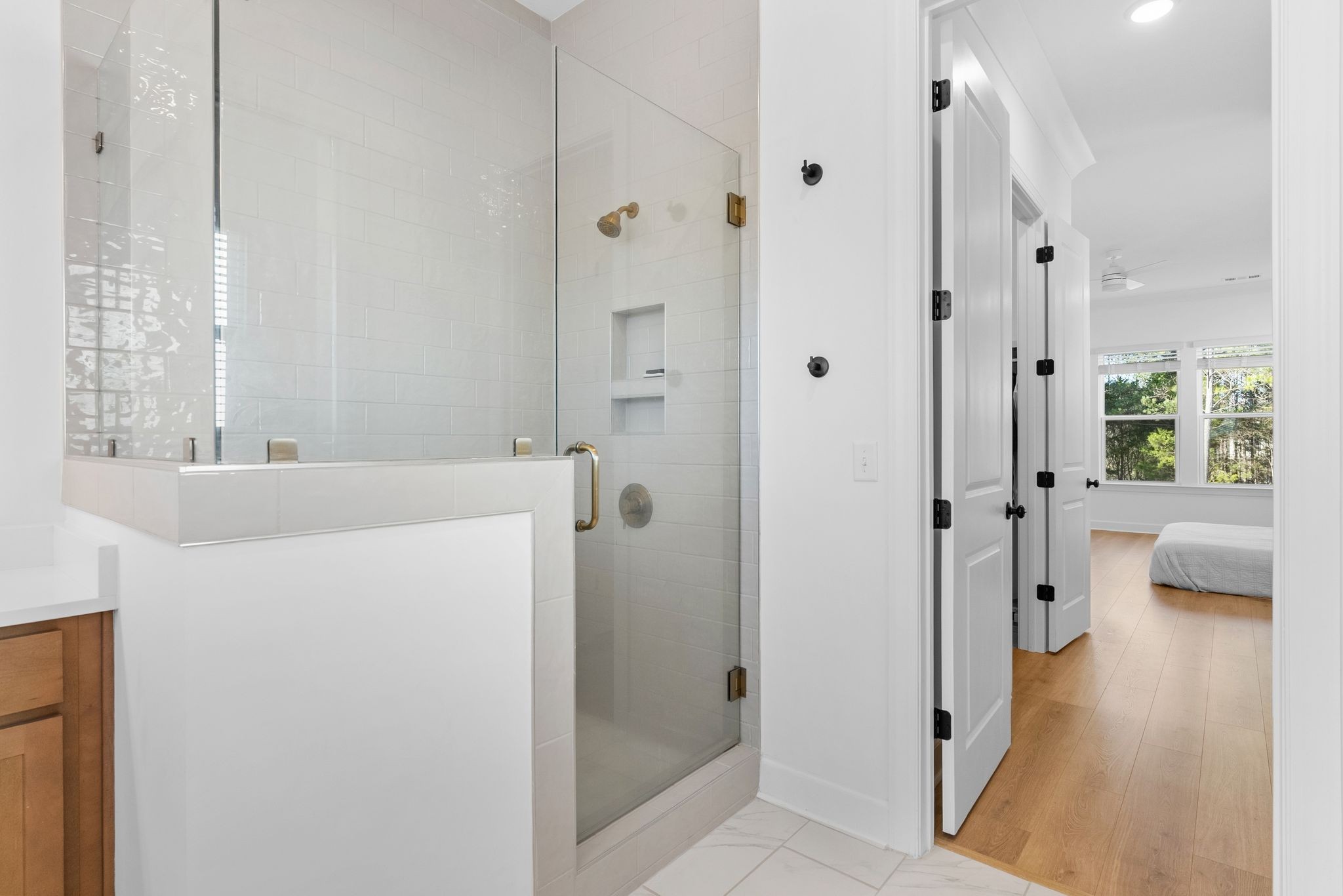 7440 Atwater Circle Fairview, TN 37062 - Photo 18 of 43 a bathroom with a bathtub and a shower