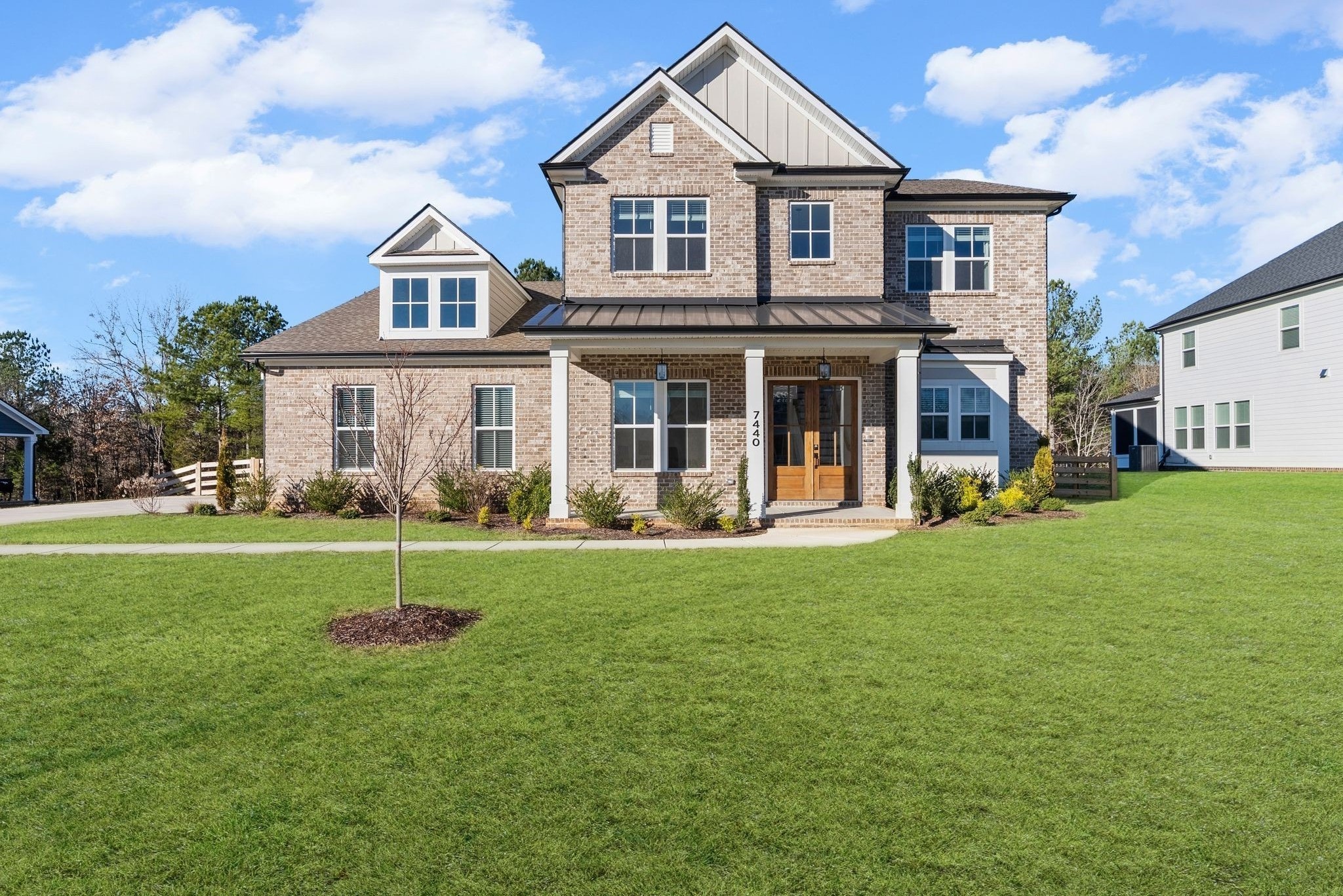 7440 Atwater Circle Fairview, TN 37062 - Photo 2 of 43 a view of a house with a backyard