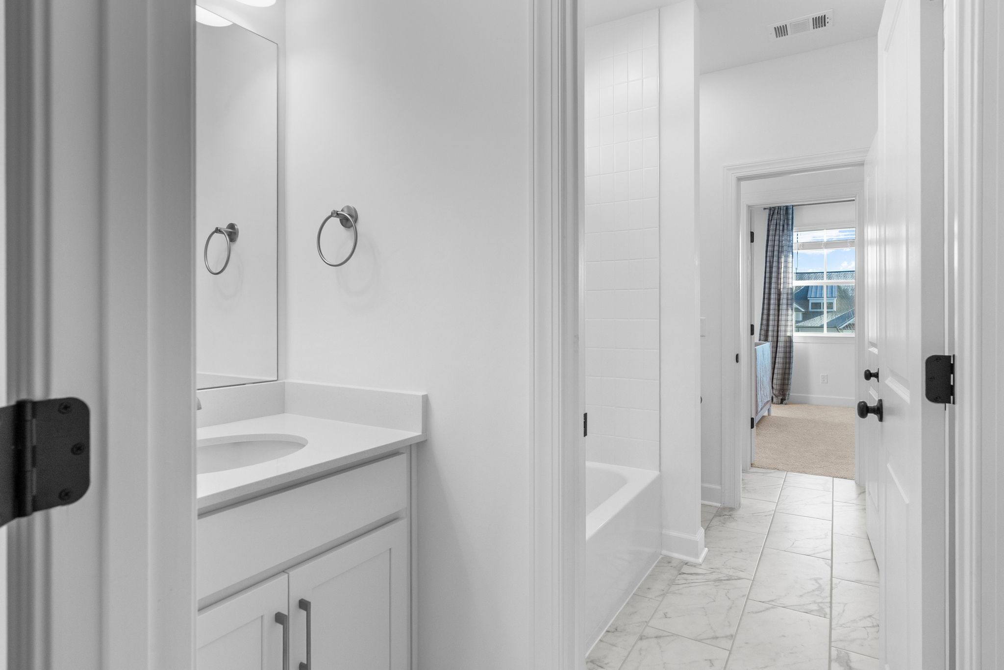 7440 Atwater Circle Fairview, TN 37062 - Photo 29 of 43 a bathroom with a sink and a mirror