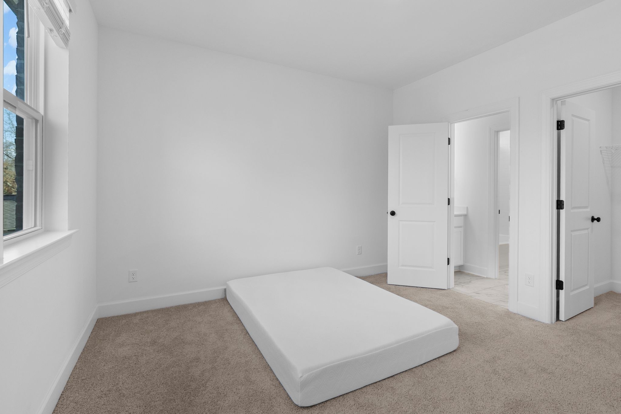 7440 Atwater Circle Fairview, TN 37062 - Photo 30 of 43 a spacious bedroom with a bed and a window