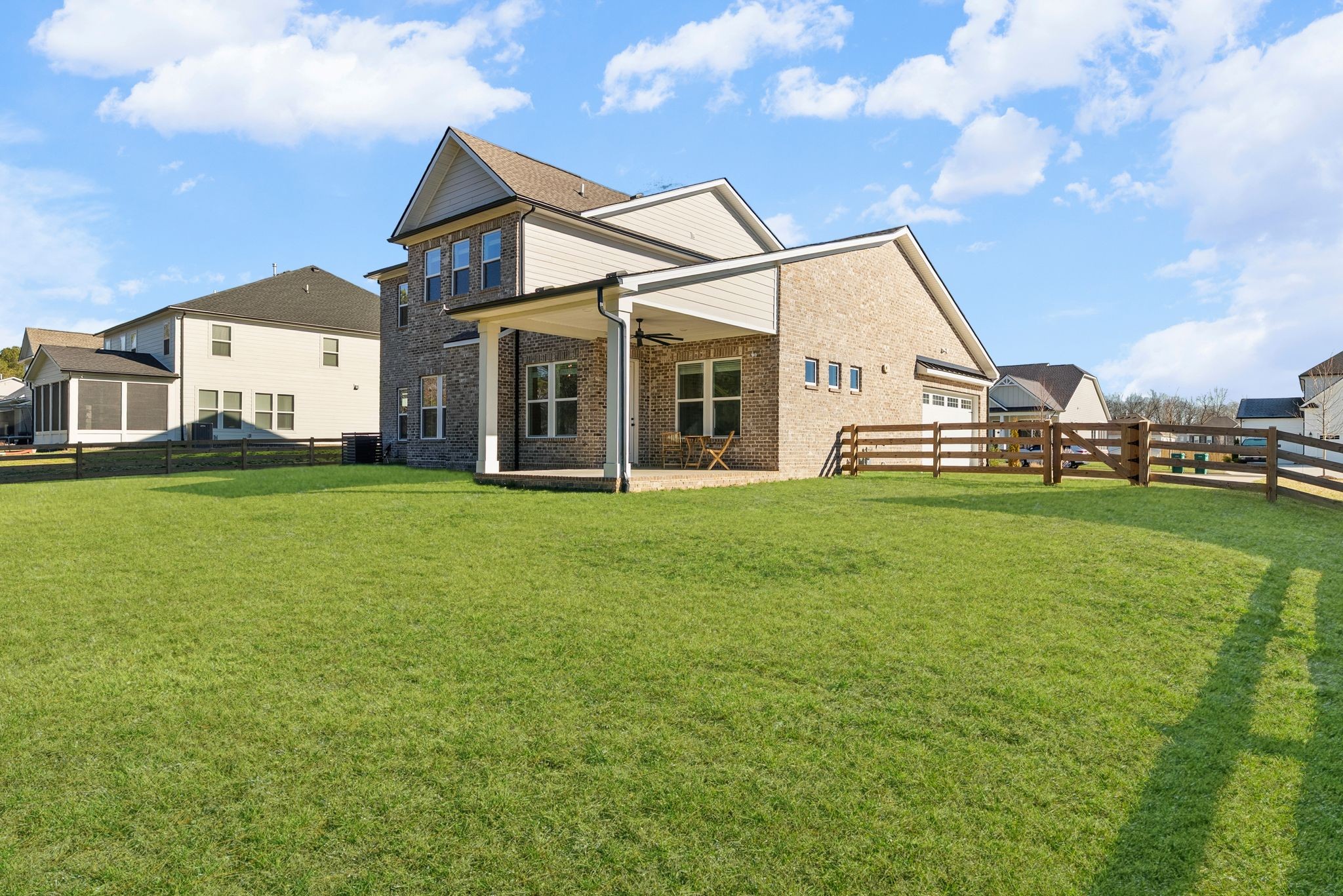 7440 Atwater Circle Fairview, TN 37062 - Photo 37 of 43 a view of a house with a big yard and large trees