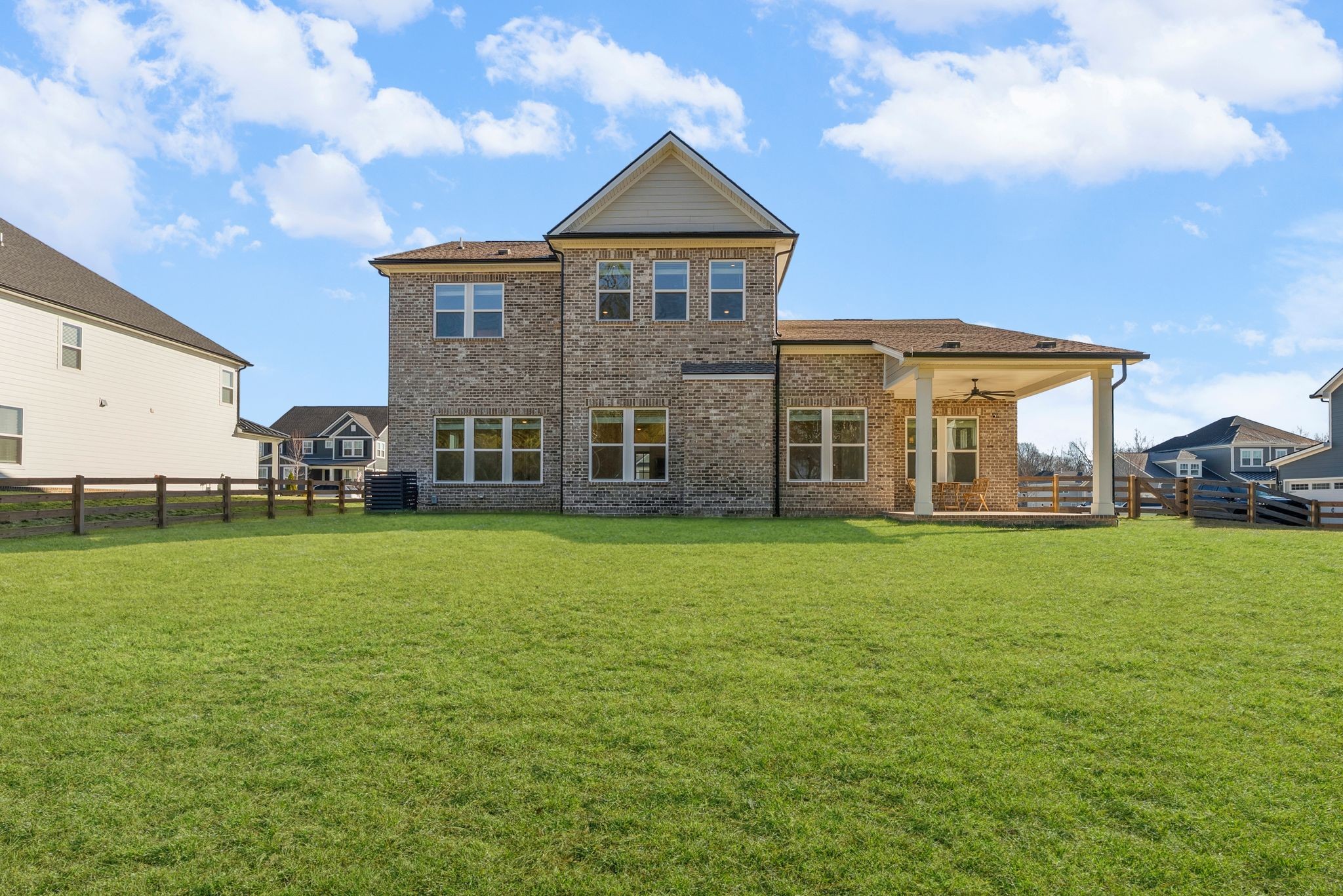 7440 Atwater Circle Fairview, TN 37062 - Photo 38 of 43 a view of a big house with a big yard and large trees