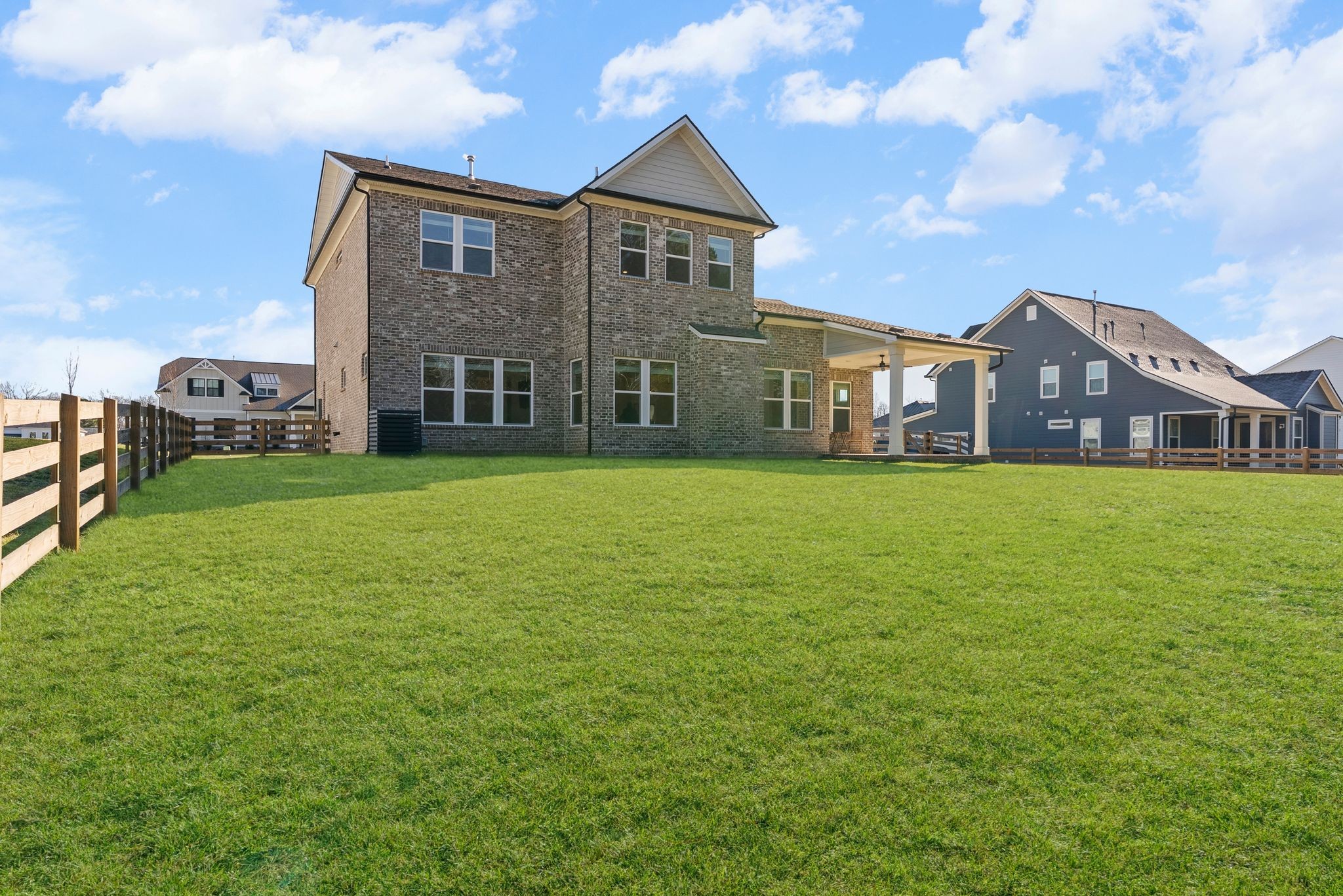 7440 Atwater Circle Fairview, TN 37062 - Photo 39 of 43 a view of a house with a big yard and large trees