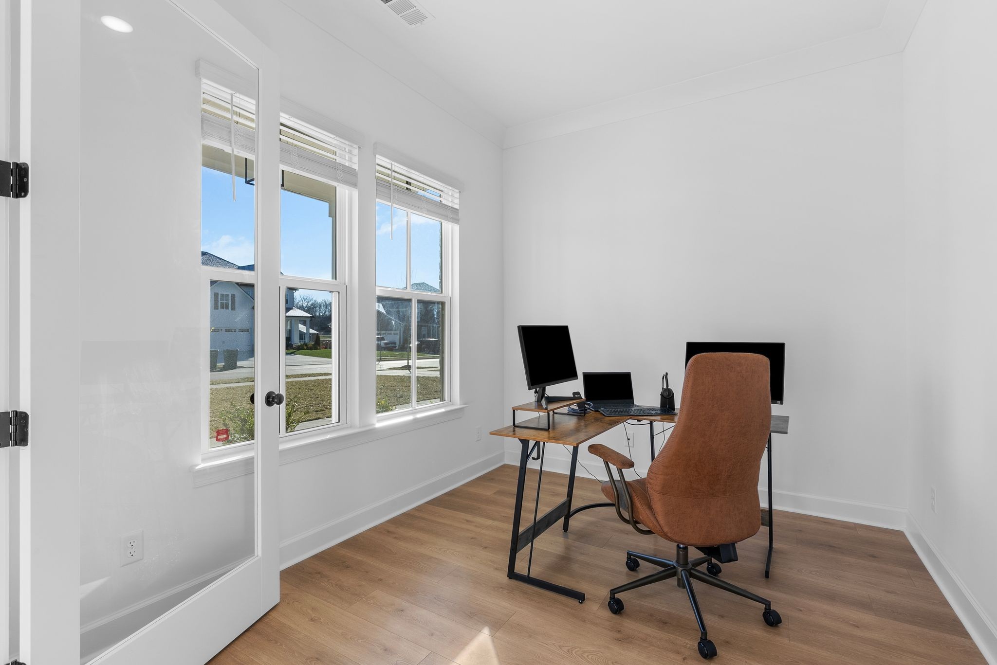 7440 Atwater Circle Fairview, TN 37062 - Photo 7 of 43 a view of a workspace with furniture and a window