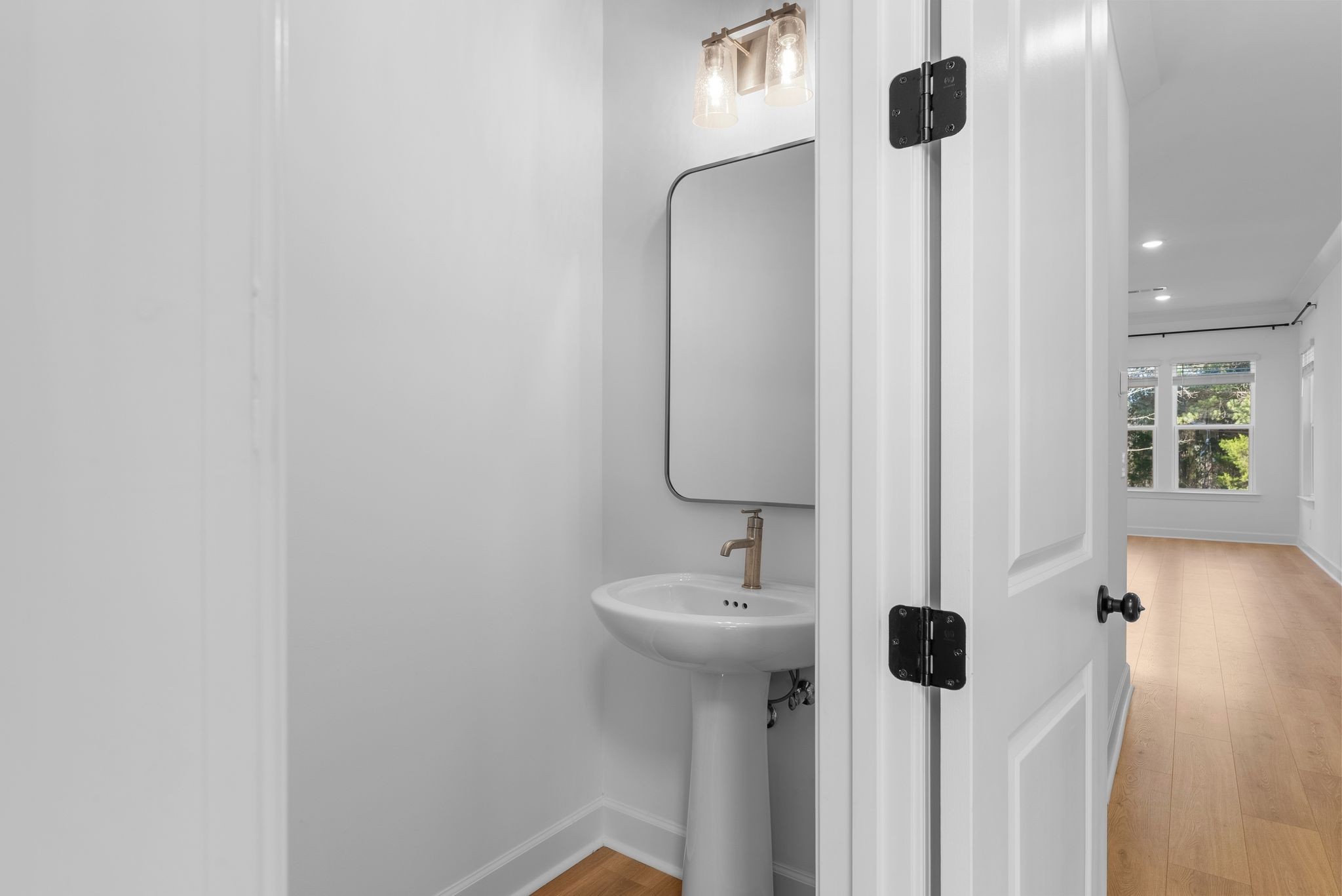 7440 Atwater Circle Fairview, TN 37062 - Photo 8 of 43 a bathroom with a sink and mirror