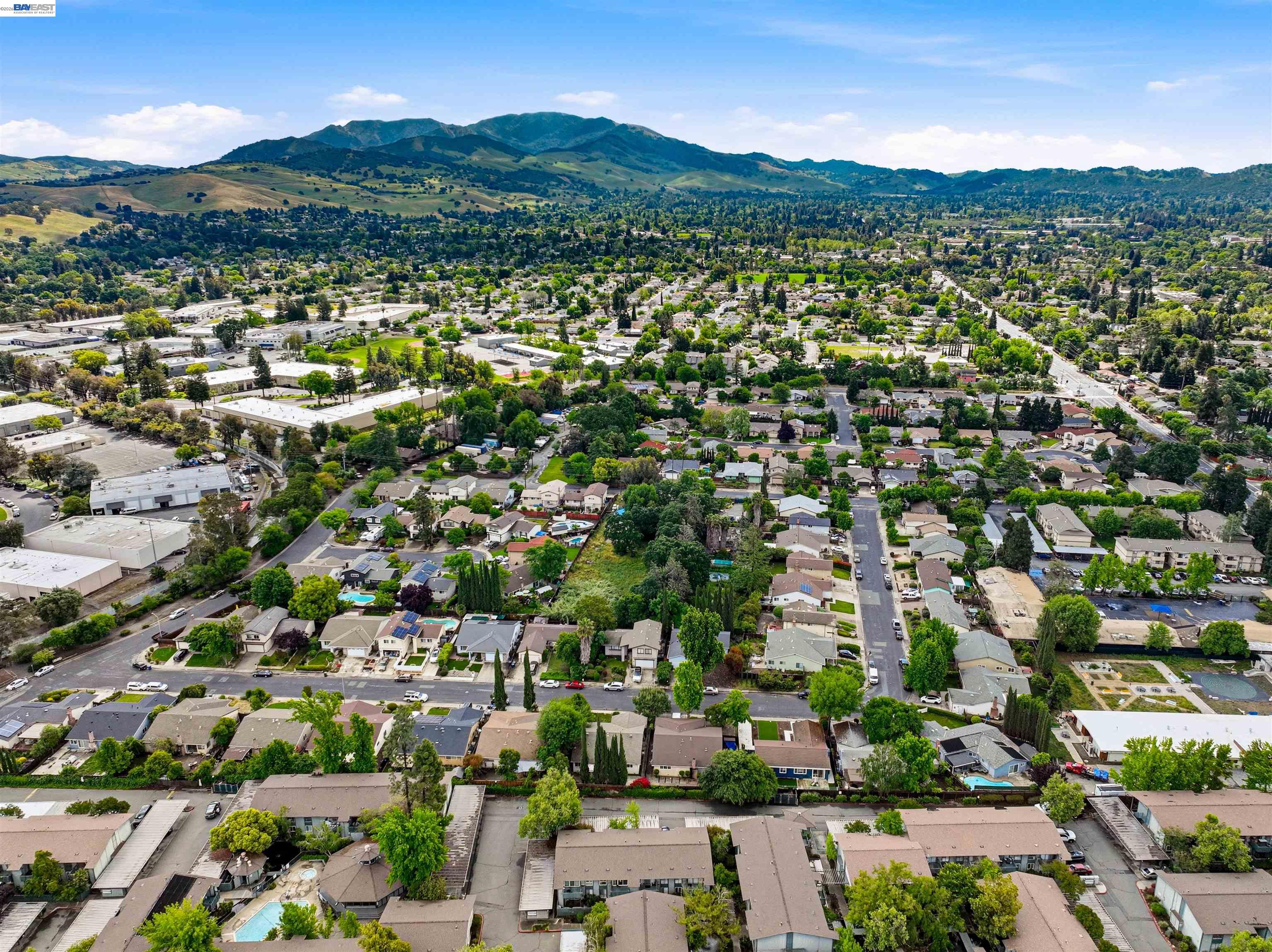 1036 Oak Grove Road, Unit 81 Concord, CA 94518 - Photo 8 of 11 an aerial view of residential houses with outdoor space and trees