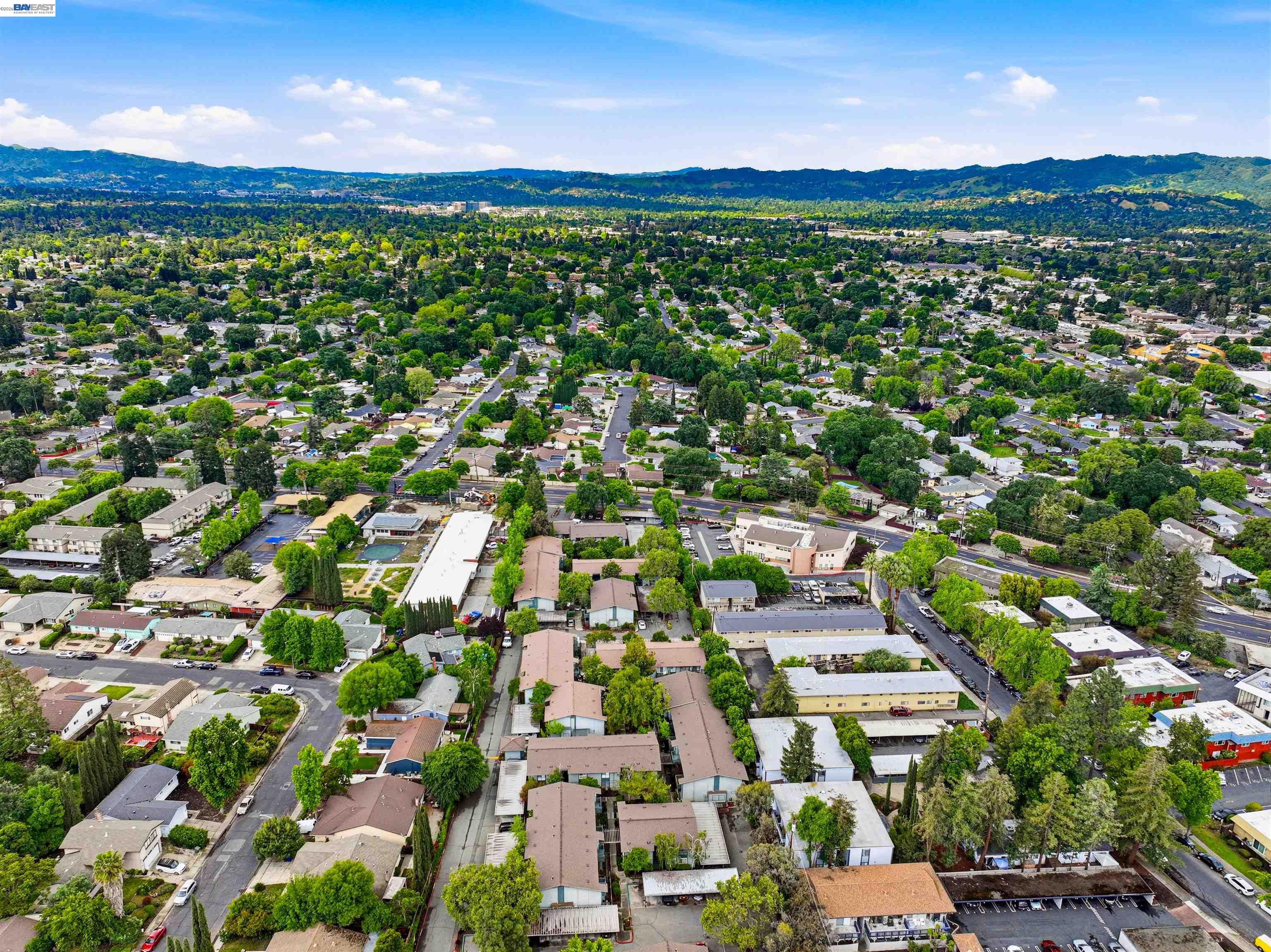 1036 Oak Grove Road, Unit 81 Concord, CA 94518 - Photo 9 of 11 an aerial view of residential houses with outdoor space and trees