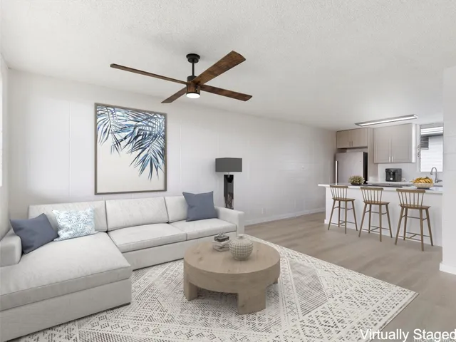 a living room with furniture and a table