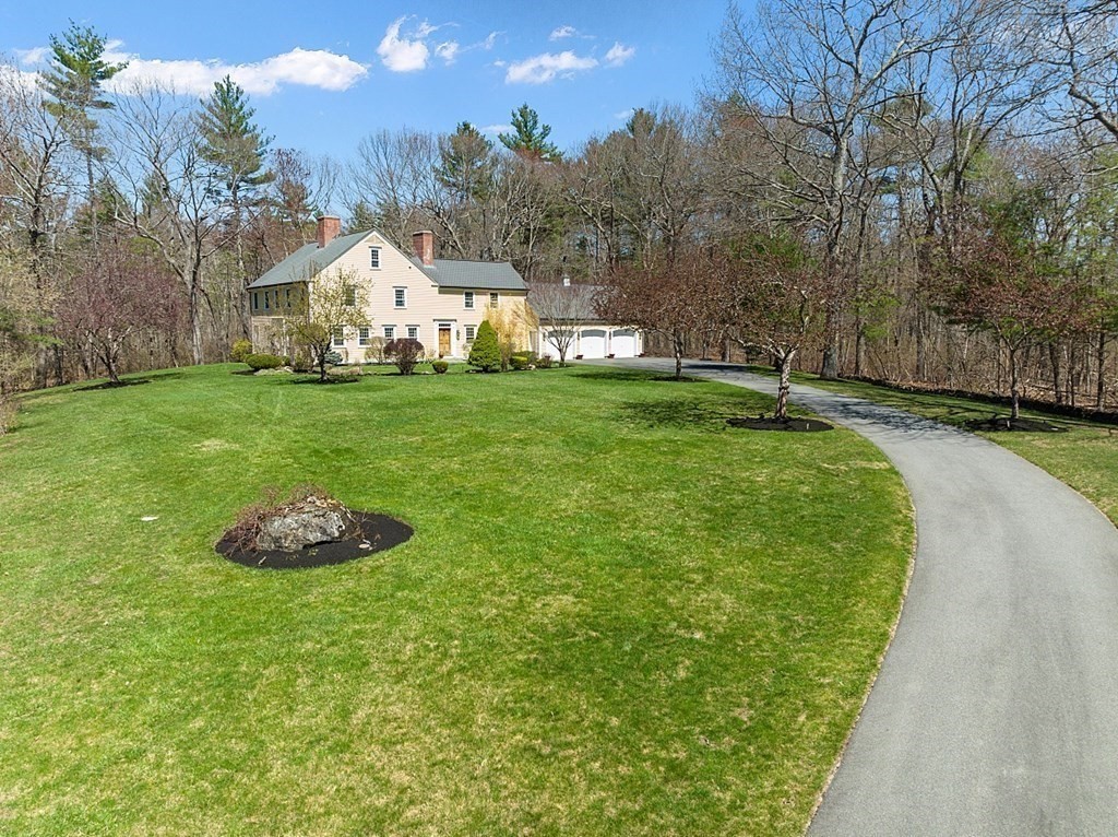 65 Lawrence Road Boxford, MA 01921 - Photo 1 of 36 a view of a garden with large trees