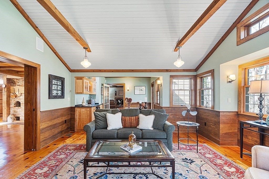 65 Lawrence Road Boxford, MA 01921 - Photo 11 of 36 a living room with furniture or couch and a table