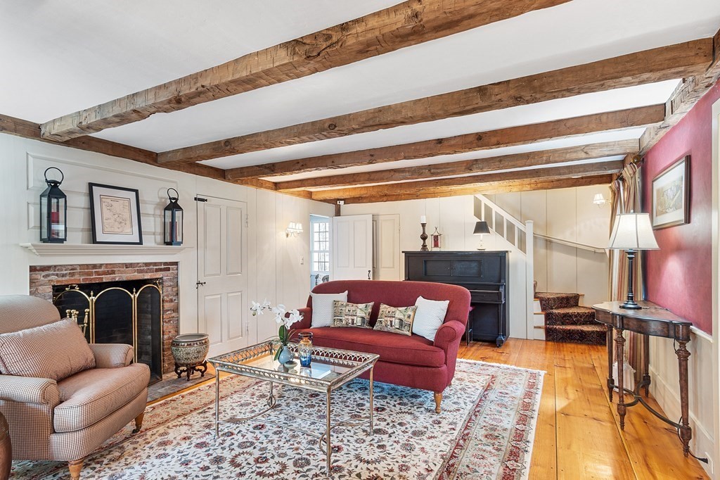 65 Lawrence Road Boxford, MA 01921 - Photo 14 of 36 a living room with furniture and a fireplace