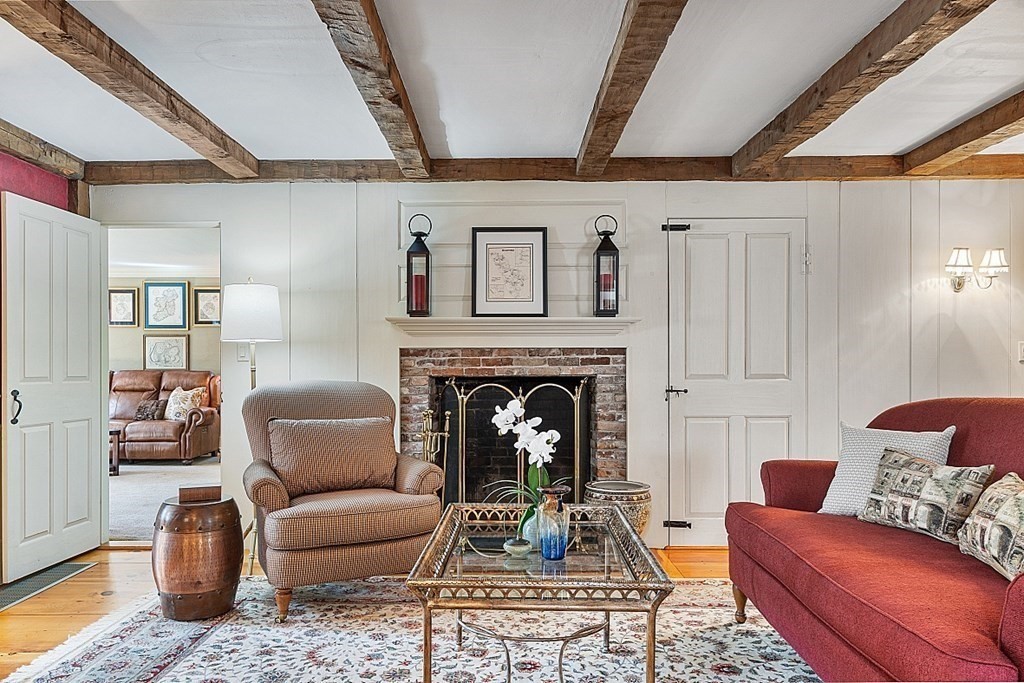 65 Lawrence Road Boxford, MA 01921 - Photo 15 of 36 a living room with furniture and a fireplace