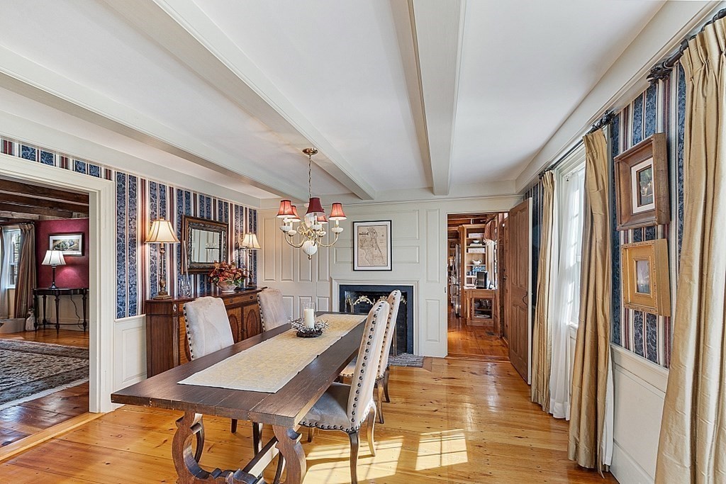 65 Lawrence Road Boxford, MA 01921 - Photo 16 of 36 a view of a dining room with furniture window and wooden floor