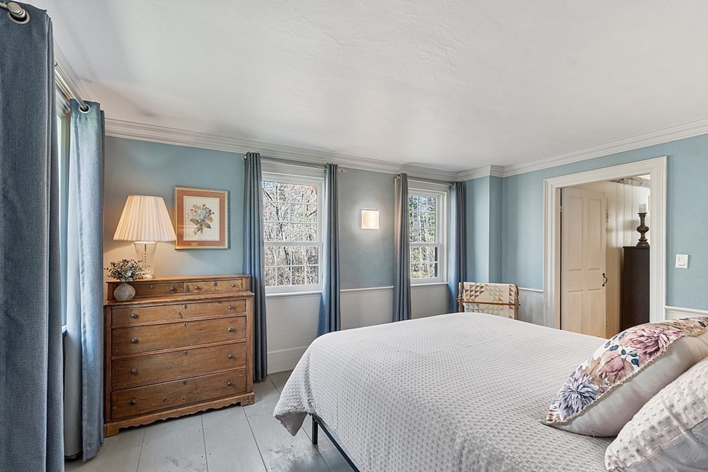 65 Lawrence Road Boxford, MA 01921 - Photo 24 of 36 a bedroom with a bed and a dresser
