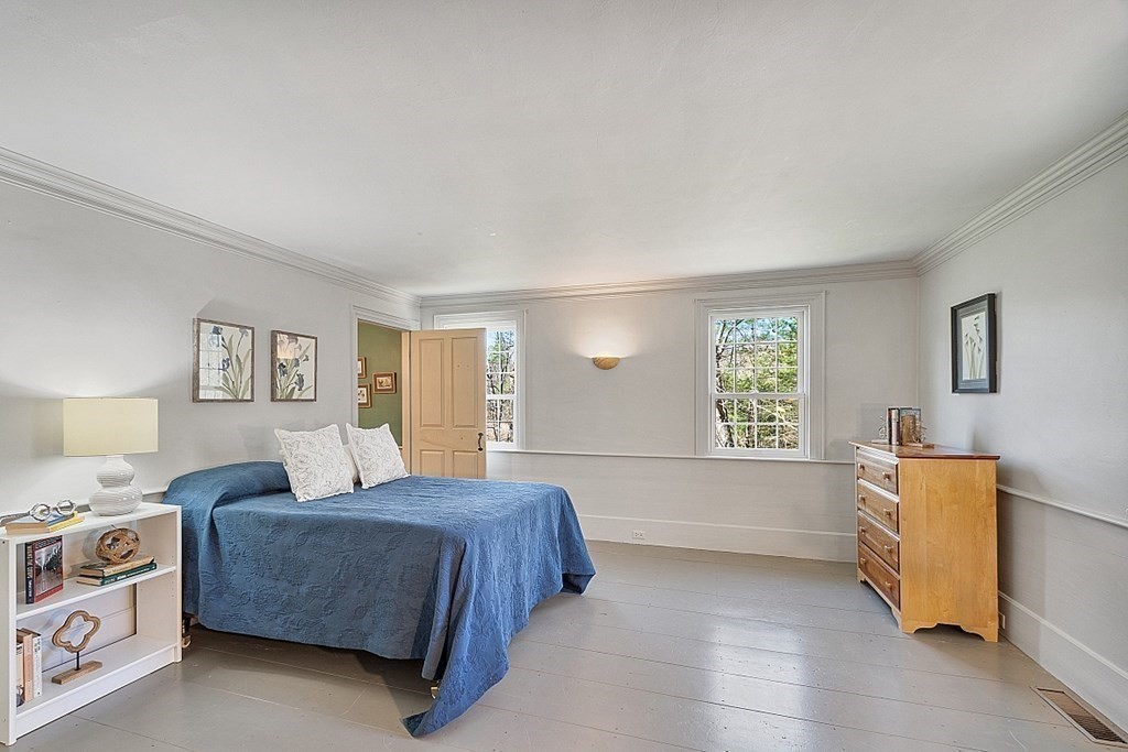 65 Lawrence Road Boxford, MA 01921 - Photo 25 of 36 a bedroom with a bed and a window