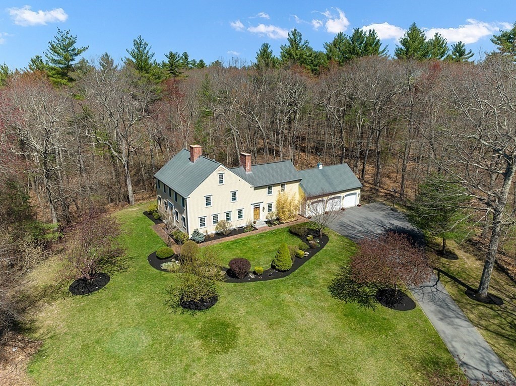 65 Lawrence Road Boxford, MA 01921 - Photo 33 of 36 an aerial view of a house with a yard