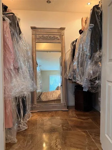 a view of a bedroom with a fireplace