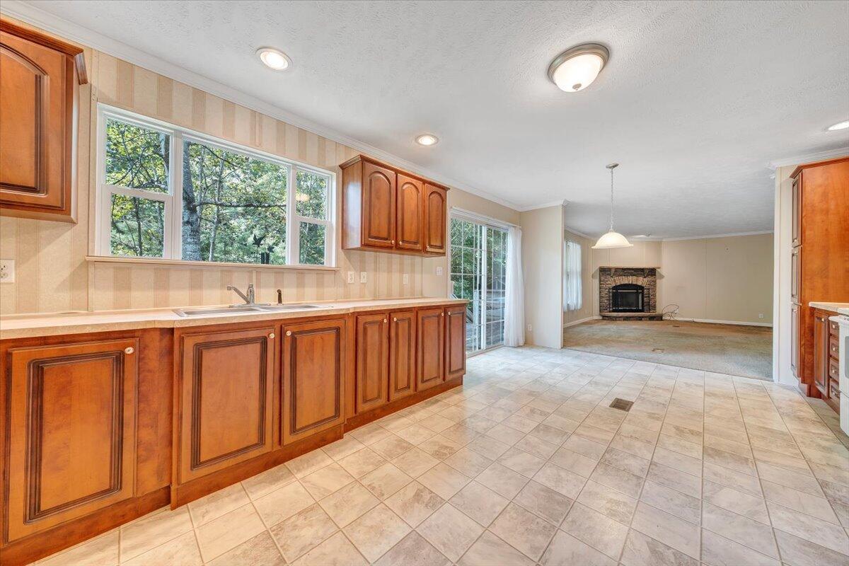 460 White Oak Road Boones Mill, VA 24065 - Photo 11 of 45 a bathroom with a sink mirror and a bathtub in it