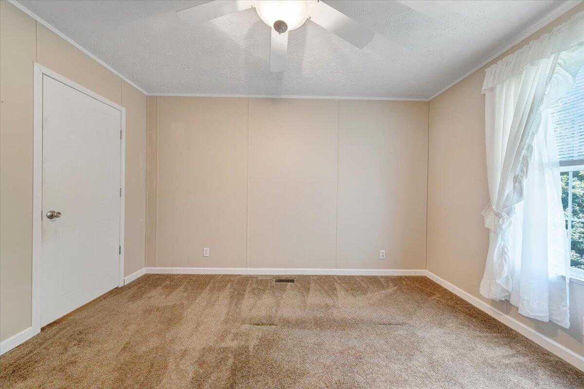 460 White Oak Road Boones Mill, VA 24065 - Photo 24 of 45 a view of an empty room with a window