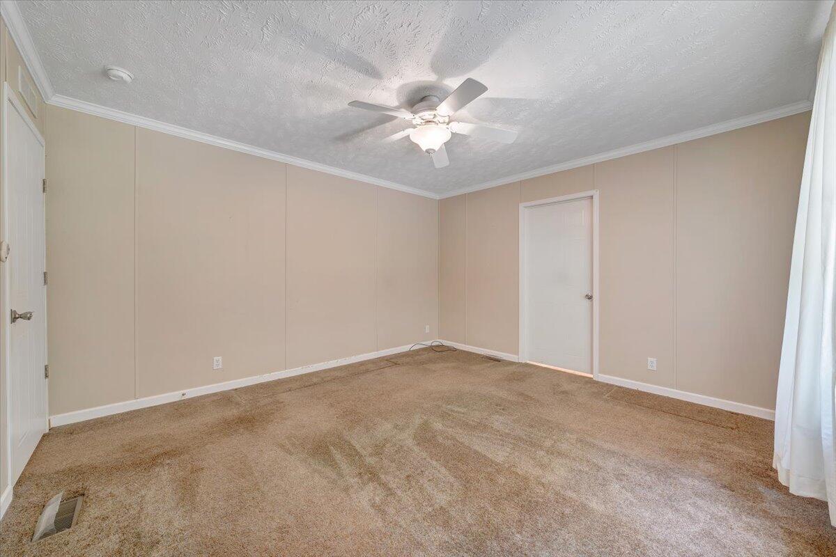 460 White Oak Road Boones Mill, VA 24065 - Photo 29 of 45 a view of an empty room with a fan