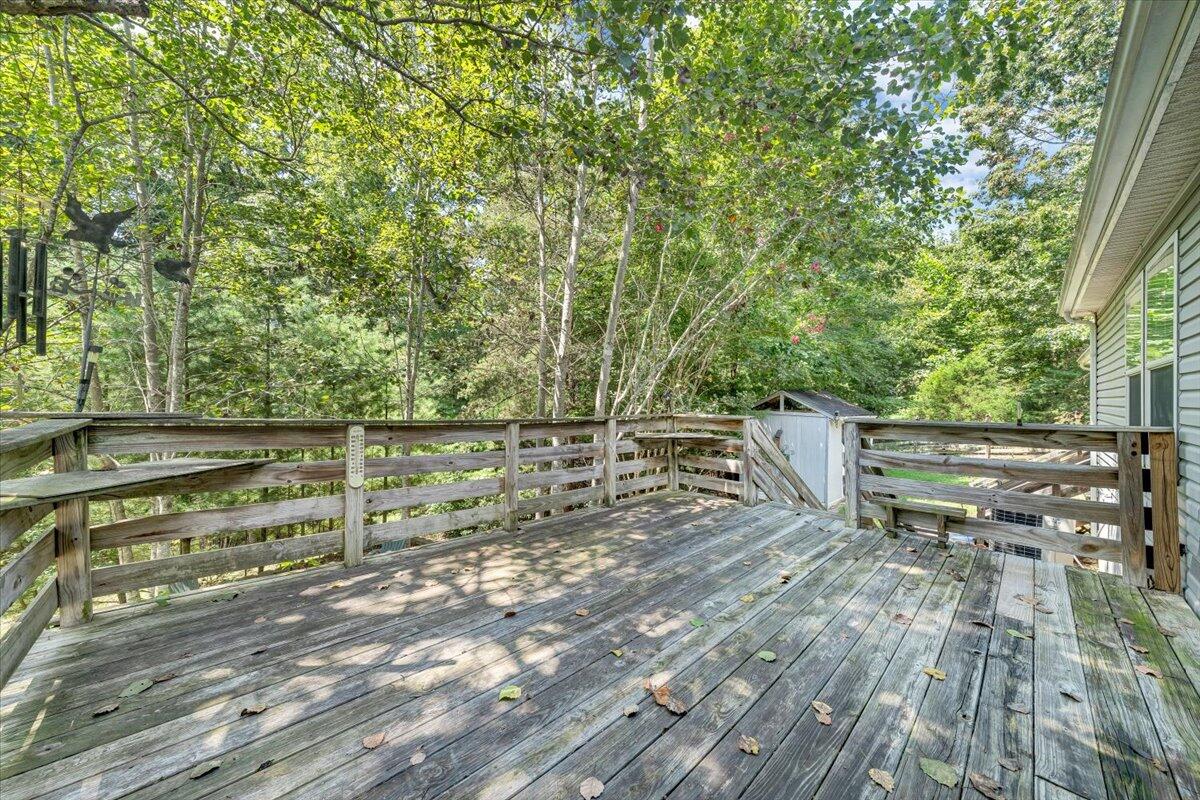460 White Oak Road Boones Mill, VA 24065 - Photo 36 of 45 a view of a deck with wooden floor and fence