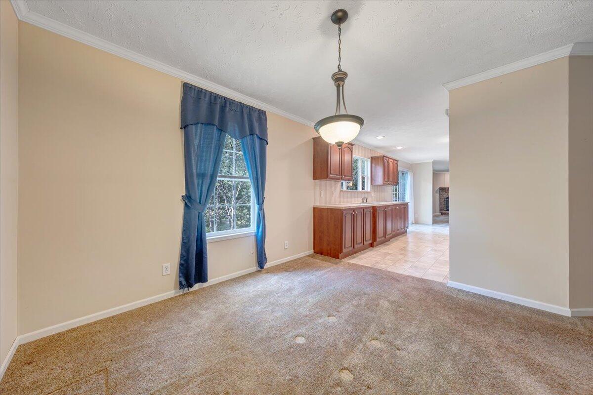 460 White Oak Road Boones Mill, VA 24065 - Photo 8 of 45 a view of a kitchen with a sink and cabinets