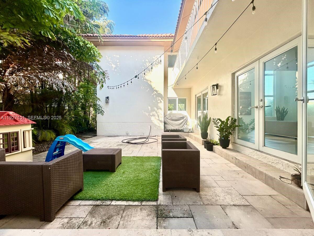 4445 Red Road Coral Gables, FL 33146 - Photo 18 of 41 a view of outdoor space yard and patio