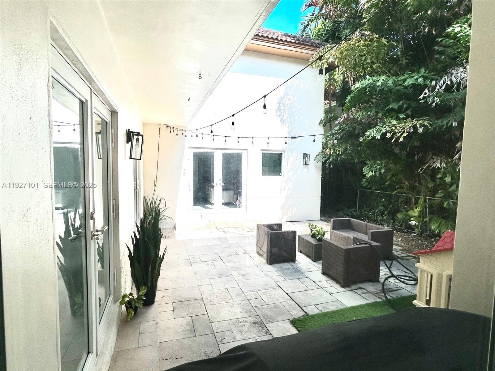 4445 Red Road Coral Gables, FL 33146 - Photo 19 of 41 a view of outdoor space yard and patio