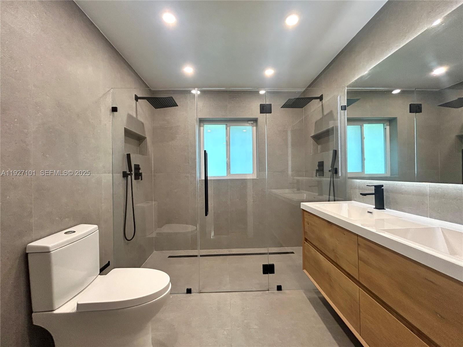 4445 Red Road Coral Gables, FL 33146 - Photo 34 of 41 a bathroom with a sink toilet and shower