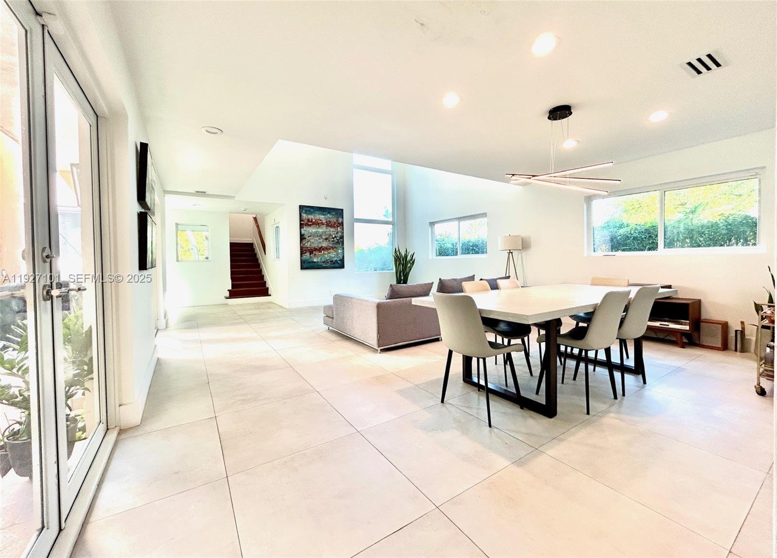 4445 Red Road Coral Gables, FL 33146 - Photo 8 of 41 a large kitchen with a table and chairs