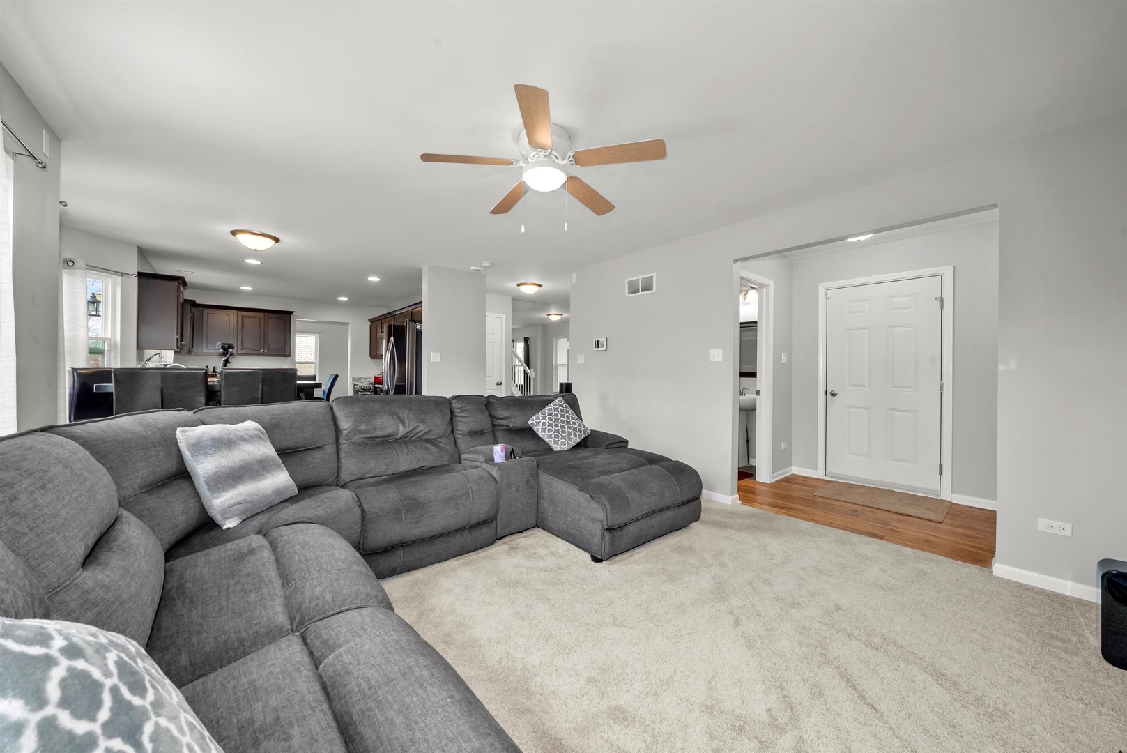 1516 Perry Street Crete, IL 60417 - Photo 13 of 35 a living room with furniture and a ceiling fan