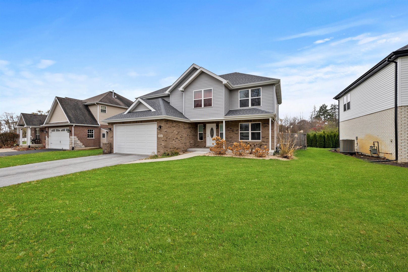 1516 Perry Street Crete, IL 60417 - Photo 2 of 35 a view of a yard in front of a house