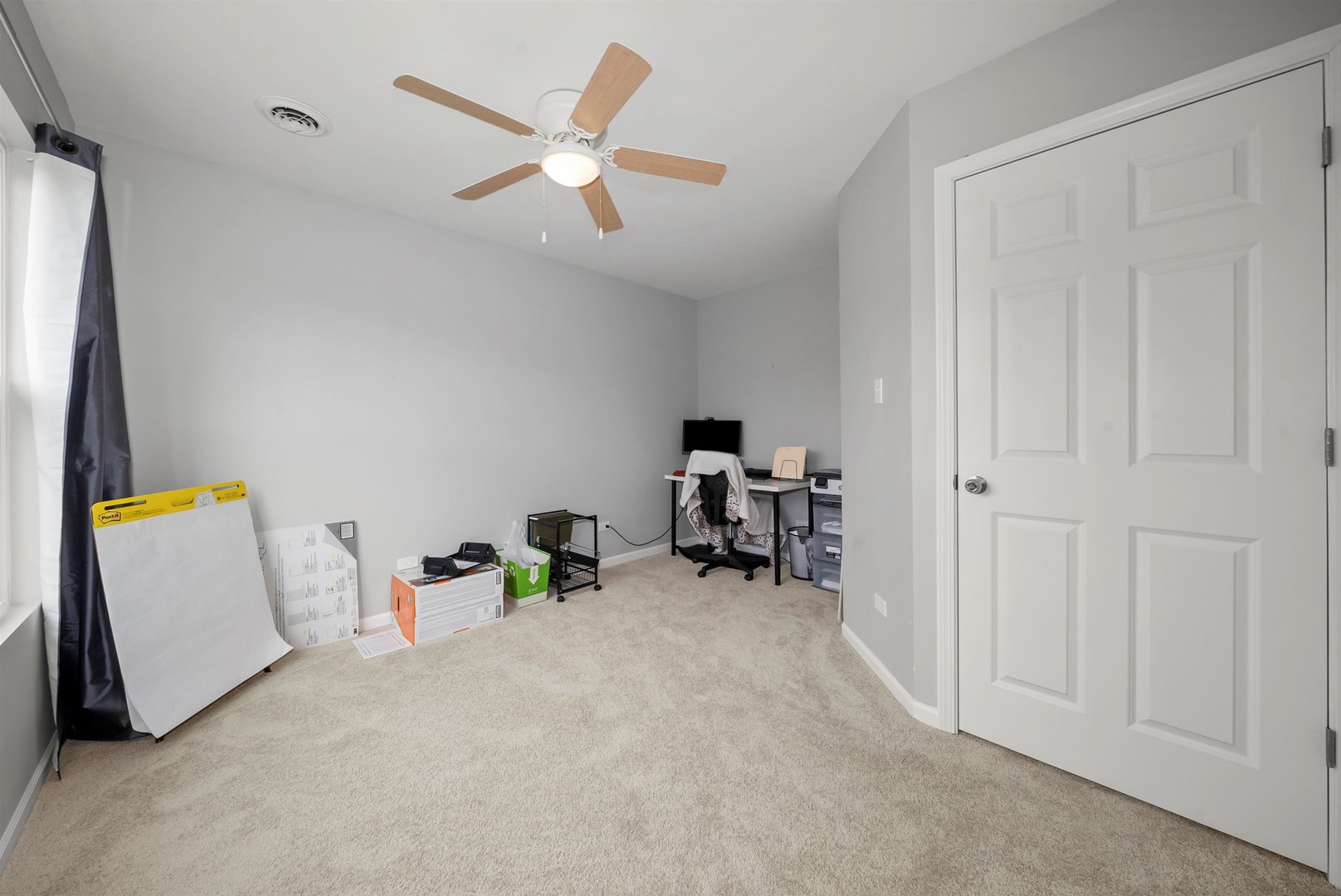 1516 Perry Street Crete, IL 60417 - Photo 21 of 35 an empty room with furniture and a ceiling fan