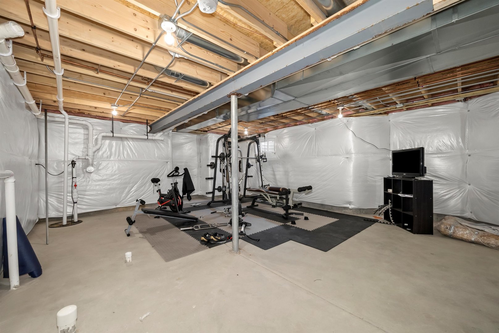 1516 Perry Street Crete, IL 60417 - Photo 23 of 35 a view of a room with gym equipment
