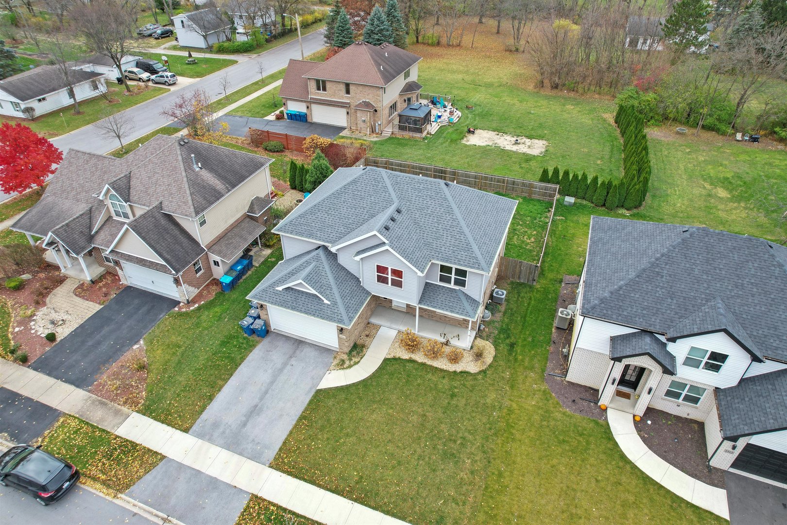 1516 Perry Street Crete, IL 60417 - Photo 30 of 35 an aerial view of a house with garden space and street view