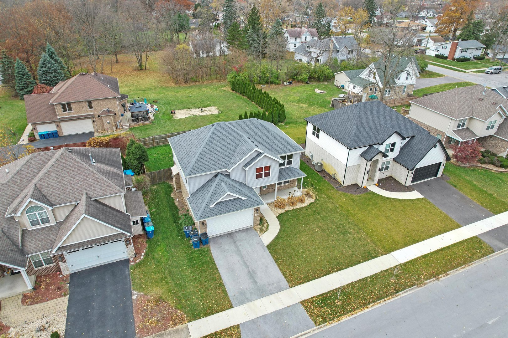 1516 Perry Street Crete, IL 60417 - Photo 31 of 35 an aerial view of a house with garden space and street view