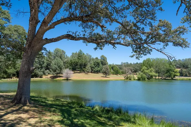 a view of a lake with a patio