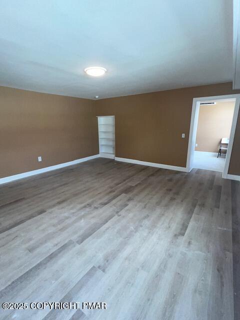 100-106 South Courtland Street, Unit 2 &3 East Stroudsburg, PA 18301 - Photo 9 of 15 a view of an empty room with wooden floor