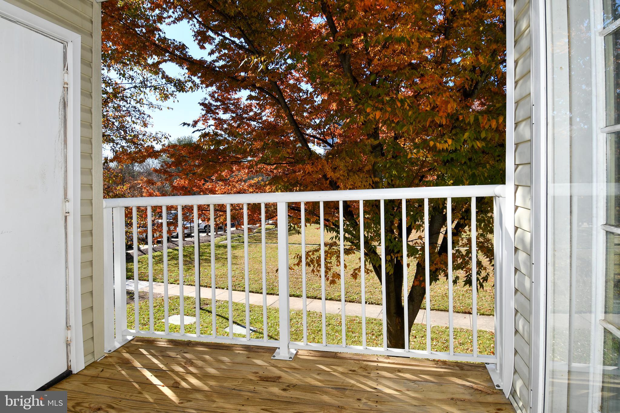 14100 Farnsworth Lane, Unit 2202 Upper Marlboro, MD 20772 - Photo 20 of 38 a view of porch with a backyard