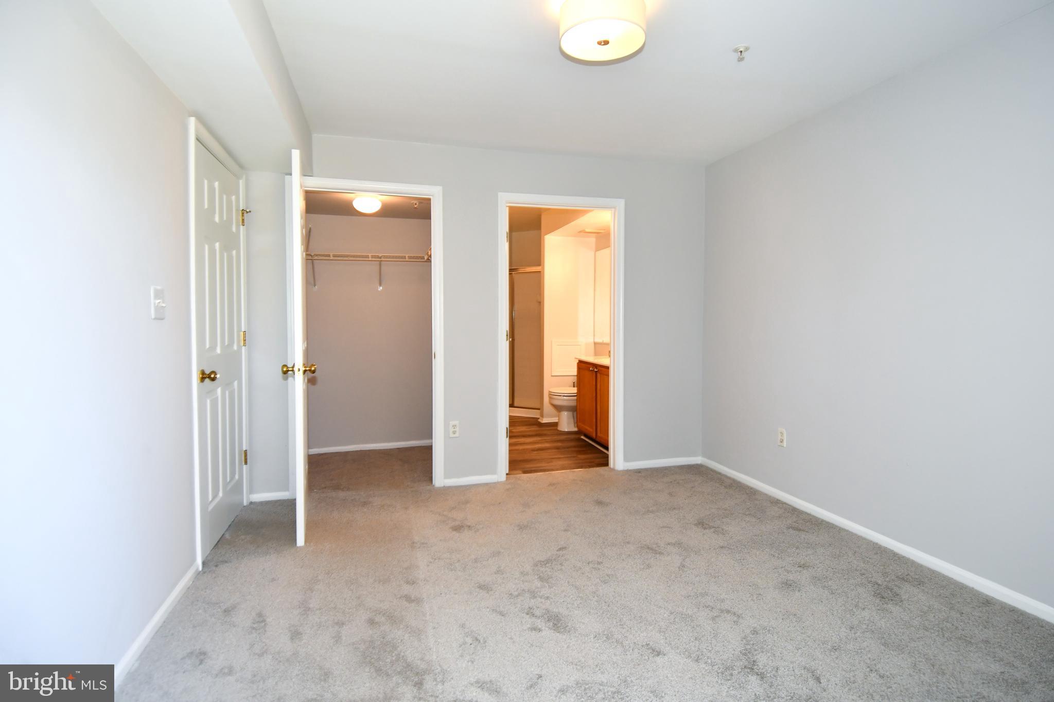 14100 Farnsworth Lane, Unit 2202 Upper Marlboro, MD 20772 - Photo 23 of 38 a view of an empty room