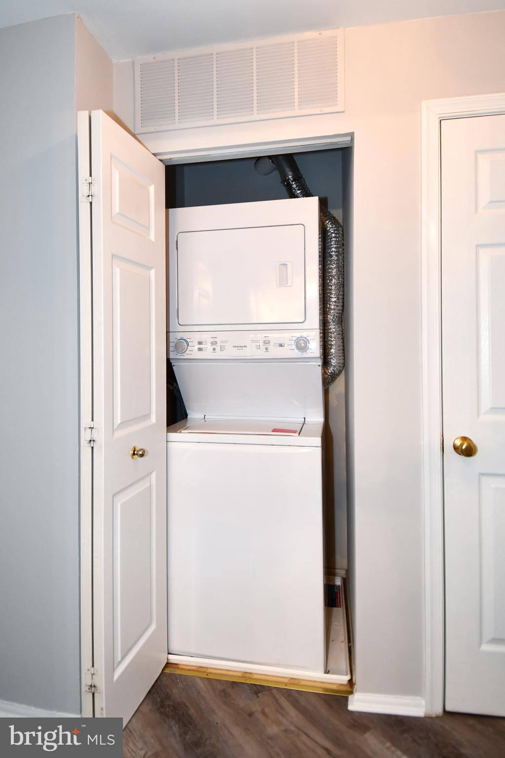 14100 Farnsworth Lane, Unit 2202 Upper Marlboro, MD 20772 - Photo 32 of 38 a utility room with dryer and washer