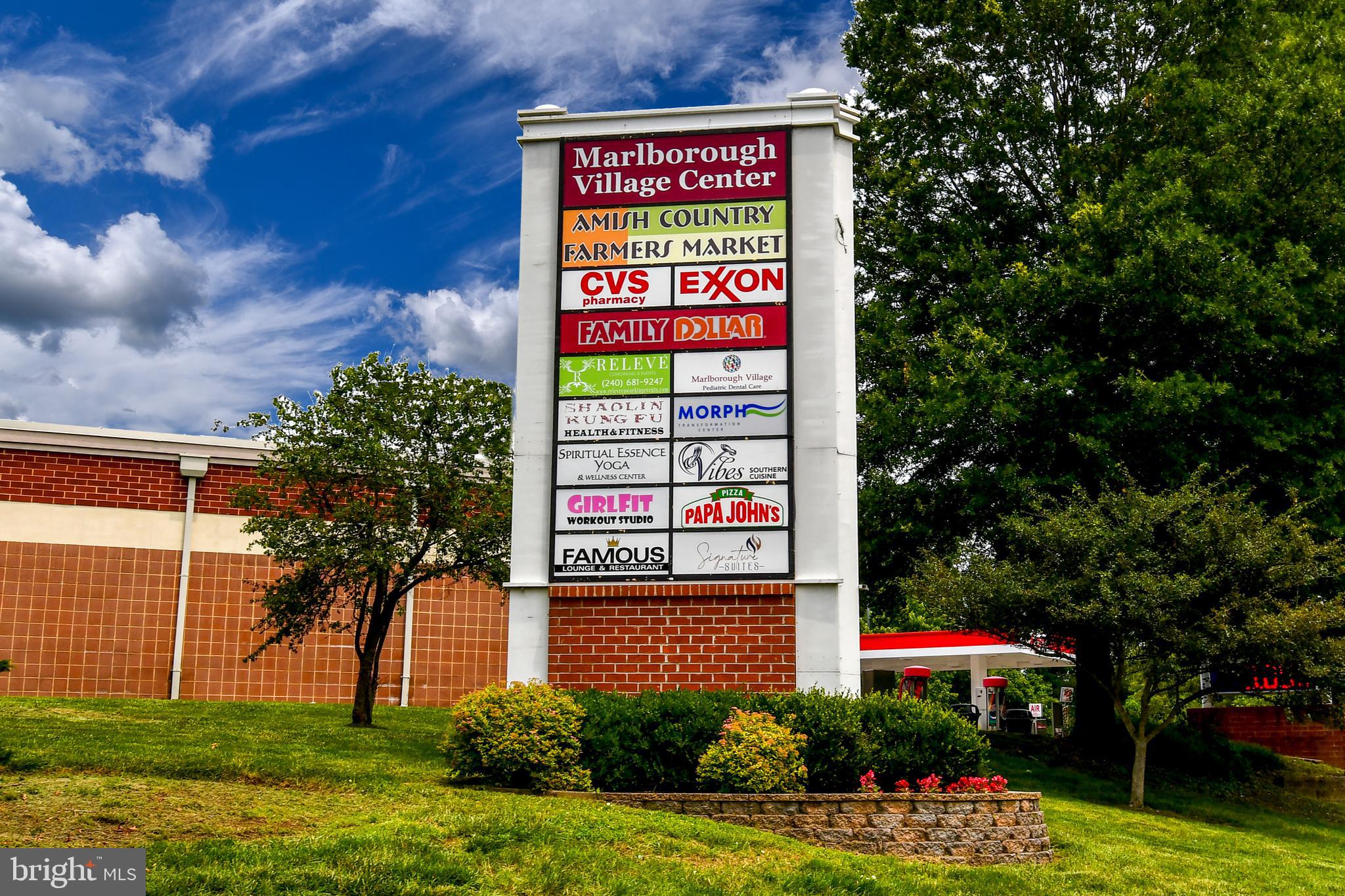 14100 Farnsworth Lane, Unit 2202 Upper Marlboro, MD 20772 - Photo 37 of 38 a sign on the side of the road