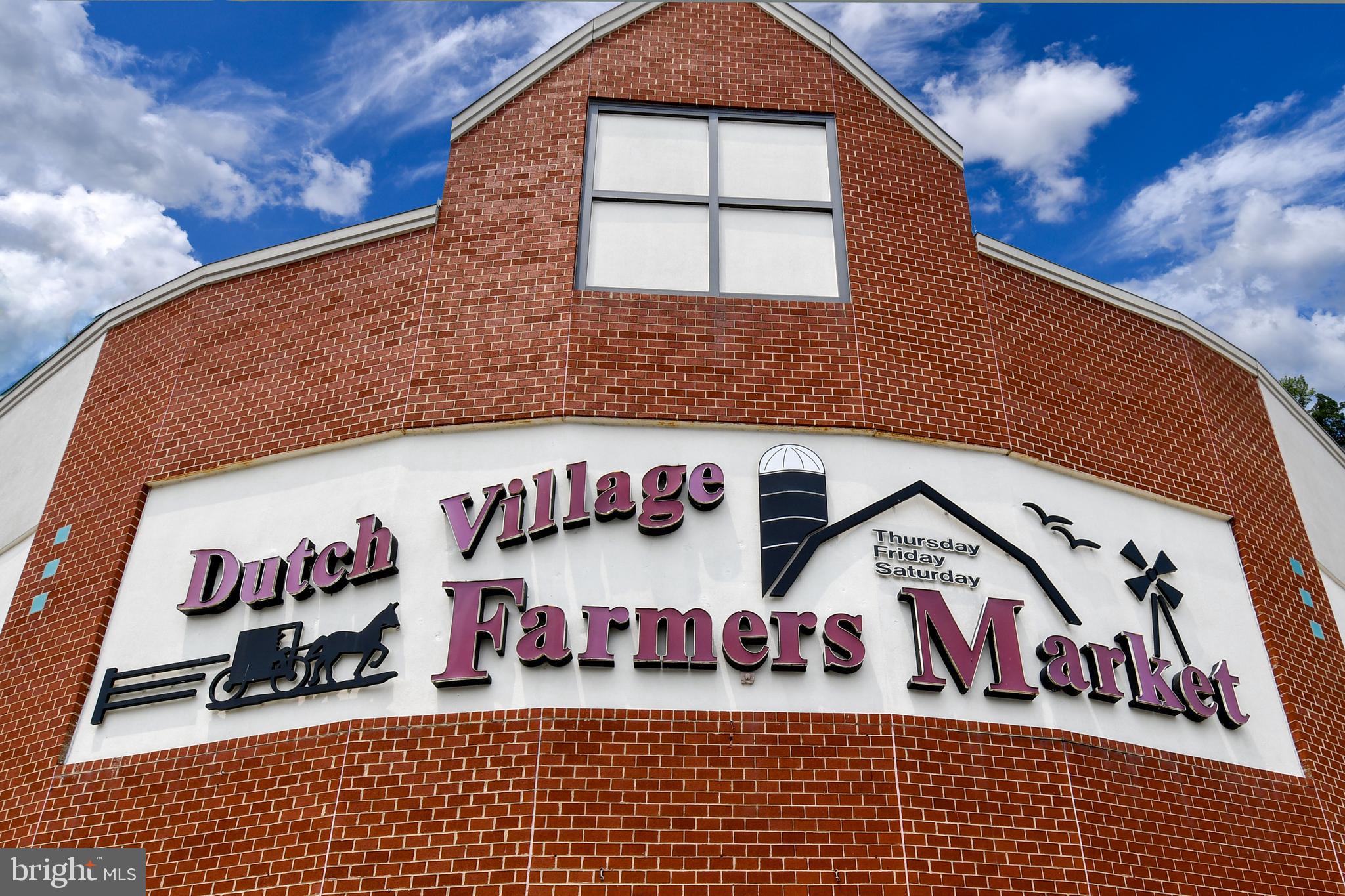 14100 Farnsworth Lane, Unit 2202 Upper Marlboro, MD 20772 - Photo 38 of 38 a view of a brick building with lots of windows