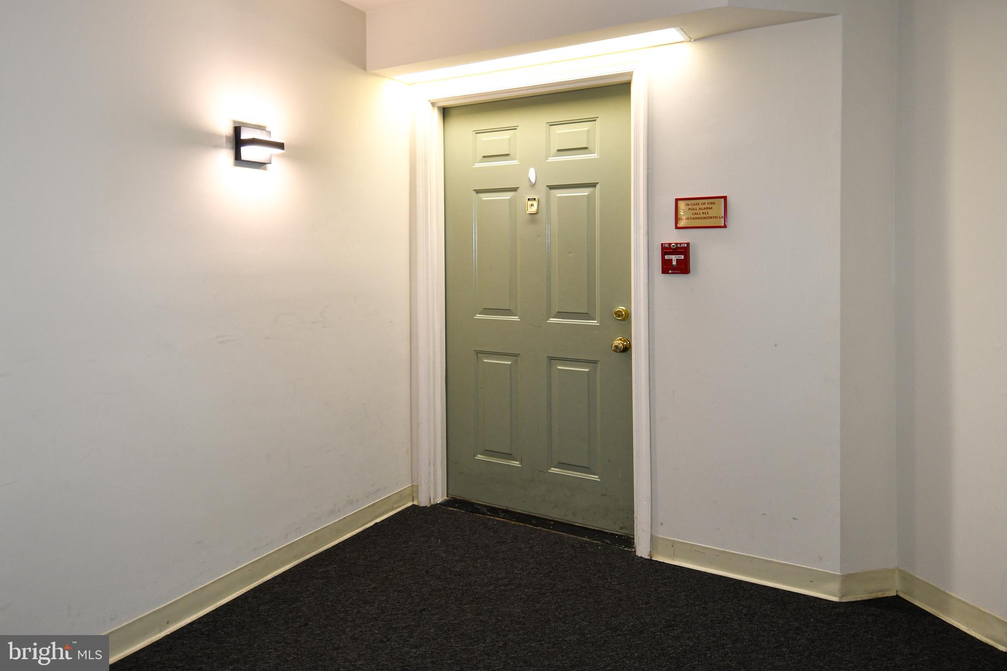 14100 Farnsworth Lane, Unit 2202 Upper Marlboro, MD 20772 - Photo 8 of 38 a view of a hallway with closet