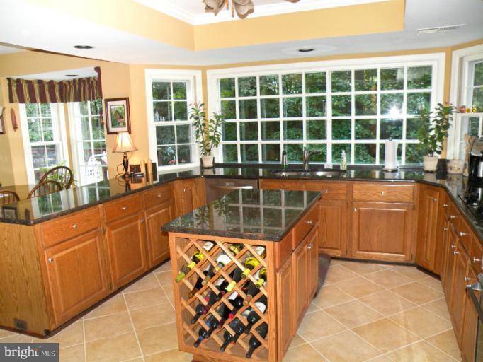 11896 Fawn Ridge Lane Reston, VA 20194 - Photo 1 of 27 GOURMET KITCHEN WITH GRANITE AND ISLAND