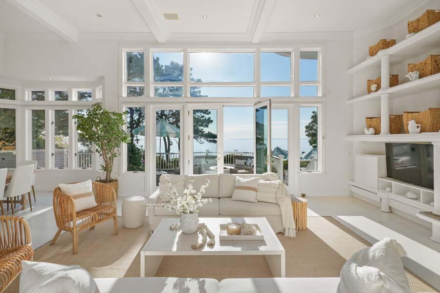 27 Ocean Bluff Drive Mashpee, MA 02649 - Photo 12 of 55 a living room with furniture large window and flat screen tv