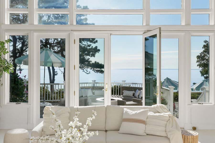 27 Ocean Bluff Drive Mashpee, MA 02649 - Photo 13 of 55 a living room with furniture and large windows