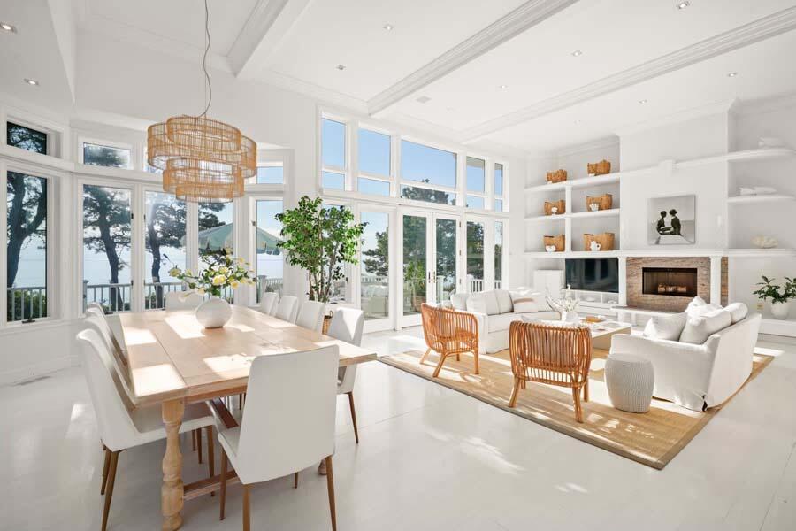 27 Ocean Bluff Drive Mashpee, MA 02649 - Photo 14 of 55 a living room with fireplace furniture and a wooden floor