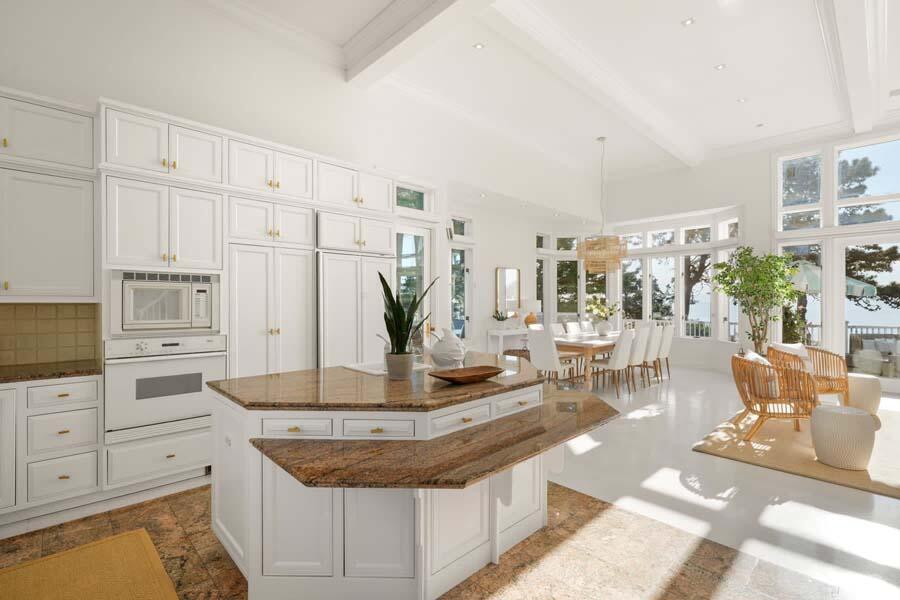 27 Ocean Bluff Drive Mashpee, MA 02649 - Photo 16 of 55 a kitchen with stainless steel appliances granite countertop a stove and a sink